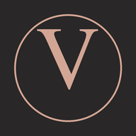 Vitalis app icon: rose-gold V on charcoal